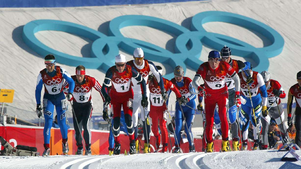 Skiers are framed in the Olympic rings at the mass start in the men's cross country 4x10 k relay race at Soldier Hollow, Utah on Feb. 17, 2002. The Salt Lake City Council on Tuesday passed a resolution that celebrates the 2002 Games and outlines goals of a future Olympics hosted by Salt Lake City.