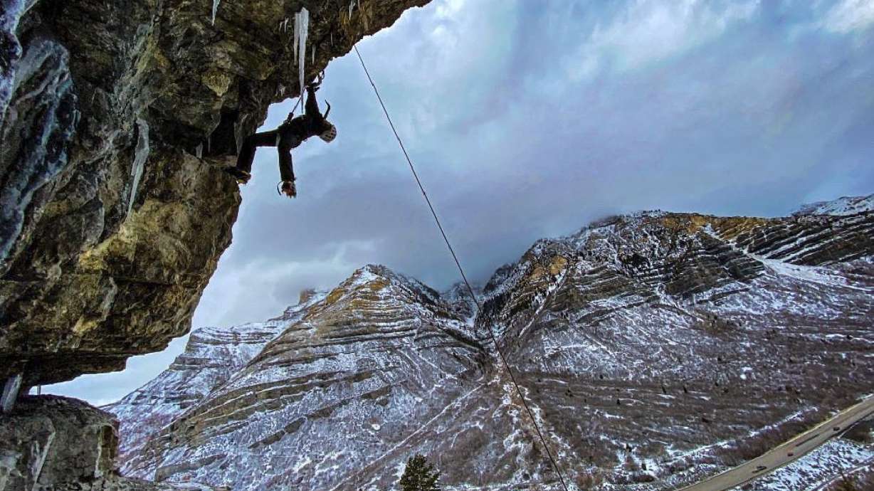 Landers Gaydosh, 12, of Riverton, hangs from a rock formation at a USA Ice Climbing training event in December. Landers won a world championship ice climbing competition on Saturday, in Switzerland.
