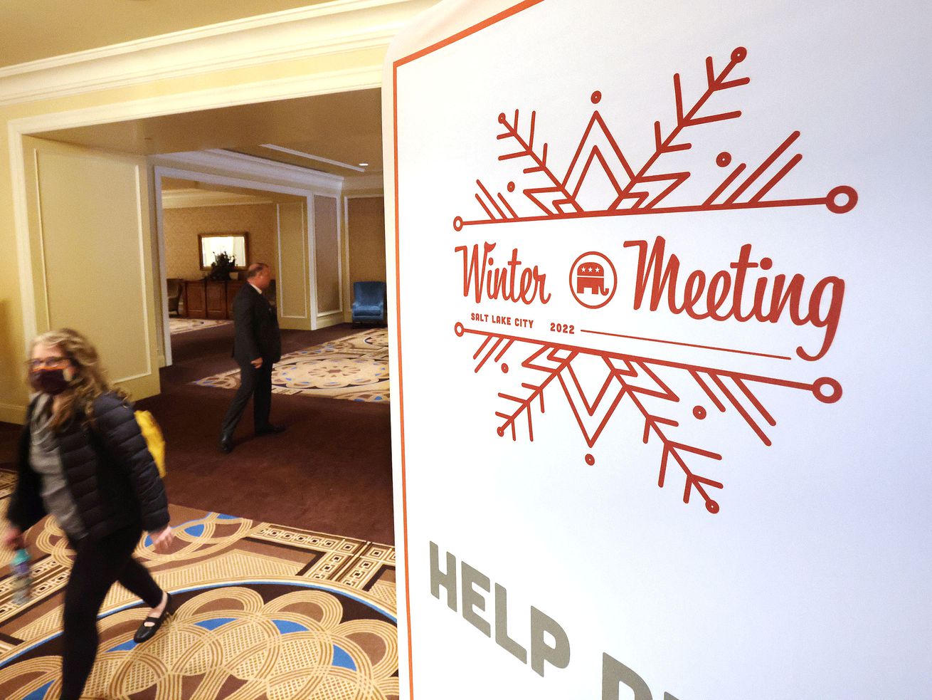 Attendees walk into the Republican National Committee winter meeting at the Grand America Hotel in Salt Lake City on Wednesday.