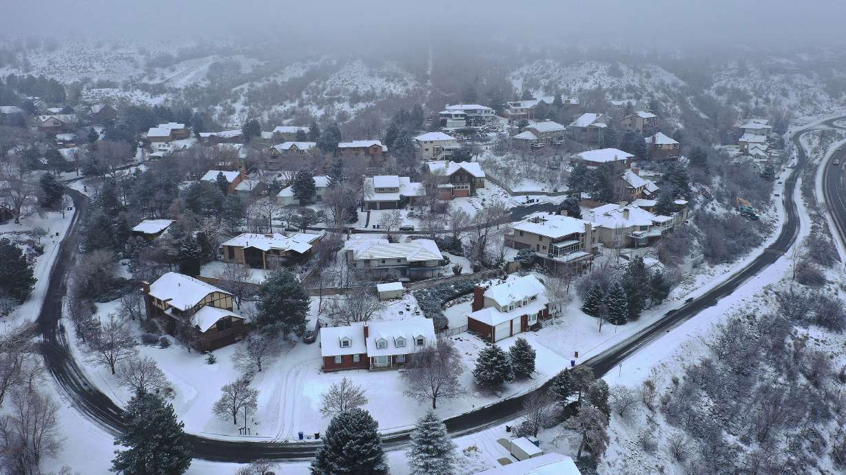 Several inches of snow cover a Cottonwood Heights neighborhood on Wednesday.