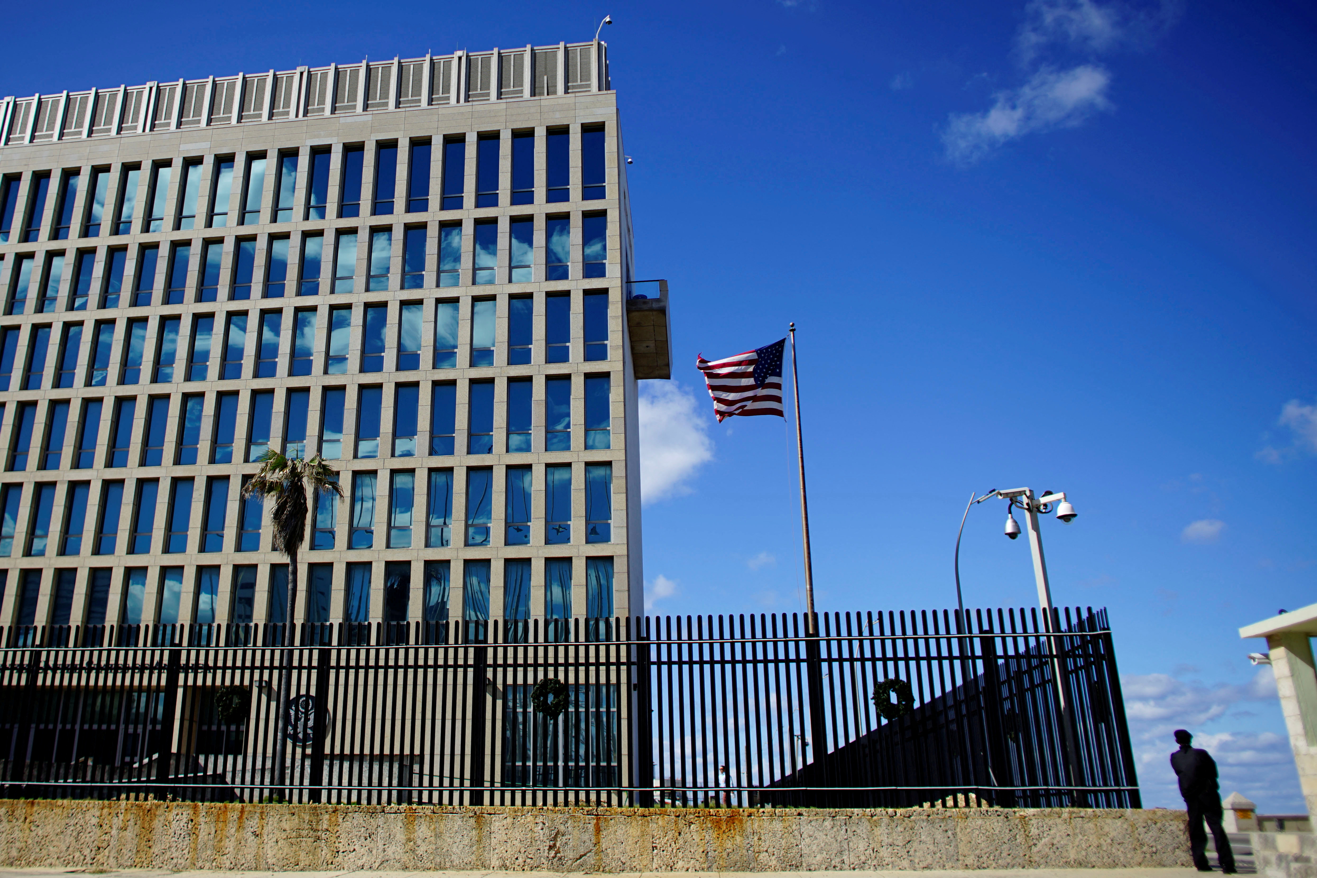 A security guard stands outside the U.S. Embassy in Havana, Cuba, Dec. 12, 2017.