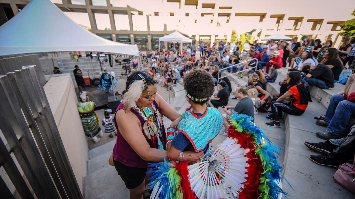 Shannon Secody helps her grandson Elija Hendricks get dressed on May 19, 2018, before his performance at a festival presented by the Salt Lake City Arts Council. The council has received a $500,000 grant from the National Endowment for the Arts to aid in the recovery of the cultural sector from the pandemic.