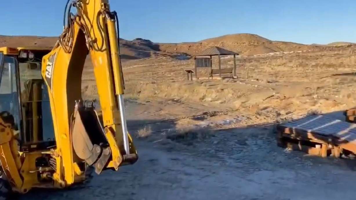 A screenshot from a video given to the Deseret News by
the Utah Friends of Paleontology shows a backhoe and the torn-up
boardwalk in Mill Canyon outside of Moab.