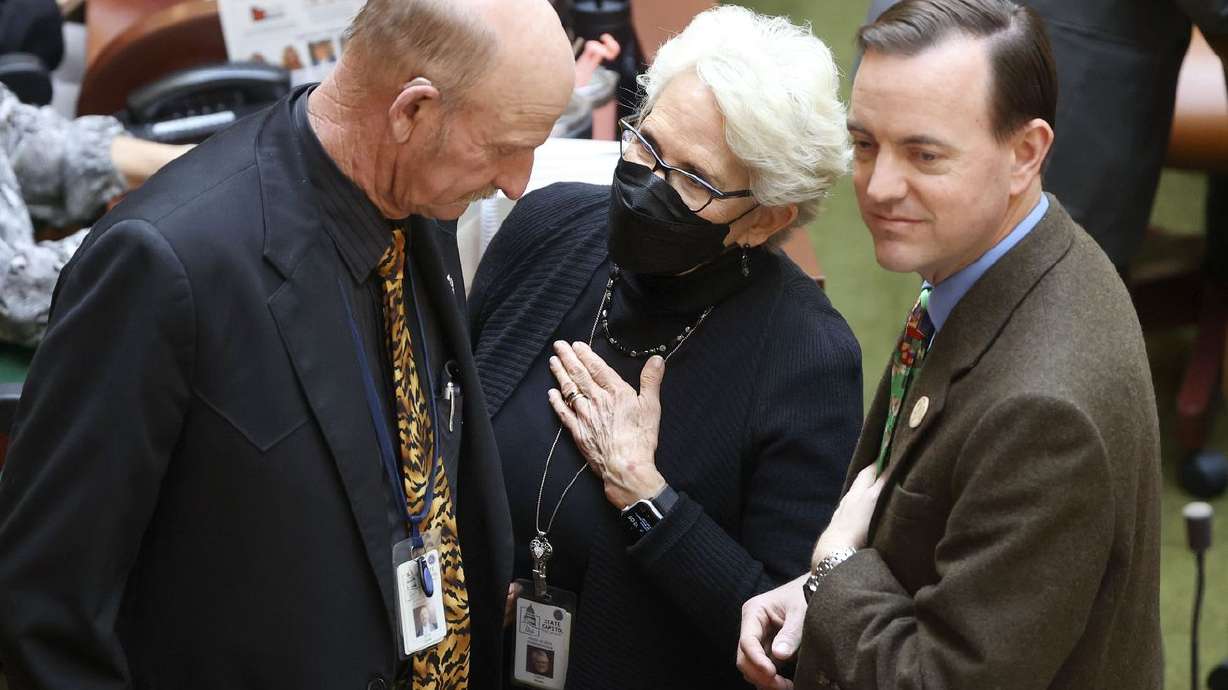 Rep. Scott Chew, R-Jensen, Rep. Carol Spackman Moss, D-Holladay, and Rep. Mike Winder, R-West Valley City, talk at the Capitol in Salt Lake City on Jan. 21. Winder is sponsoring bills that would create an earned income tax credit for low- and moderate-income Utahns, as well as a bill expanding eligibility for Utah’s Social Security tax credit.