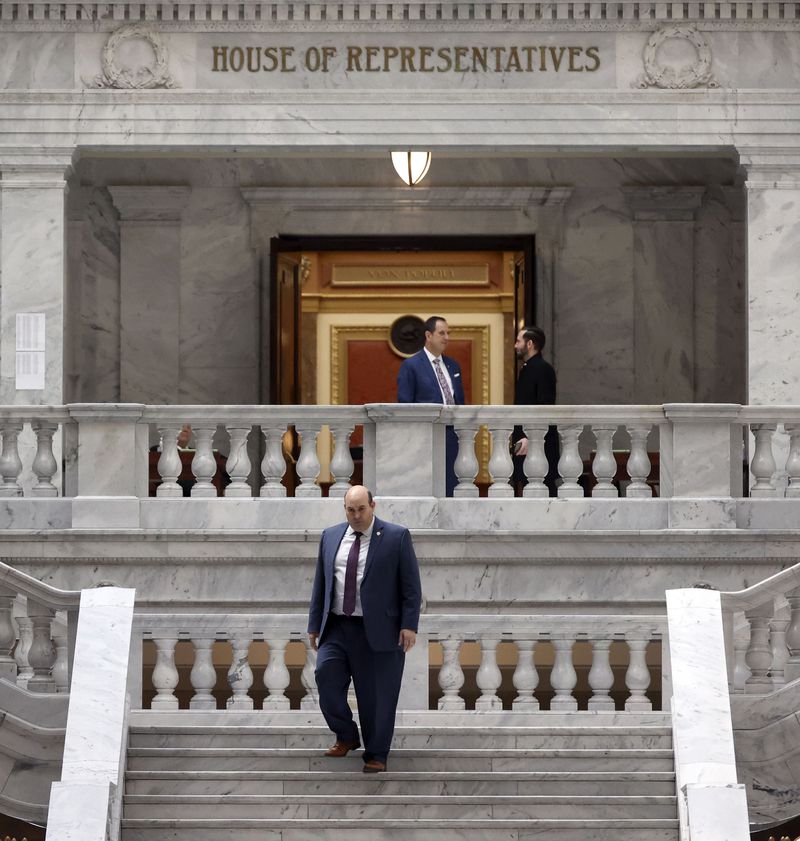 Rep. Walt Brooks, R-St. George, walks to the rotunda
after the morning session of the Utah Legislature at the Capitol in
Salt Lake City on Wednesday.