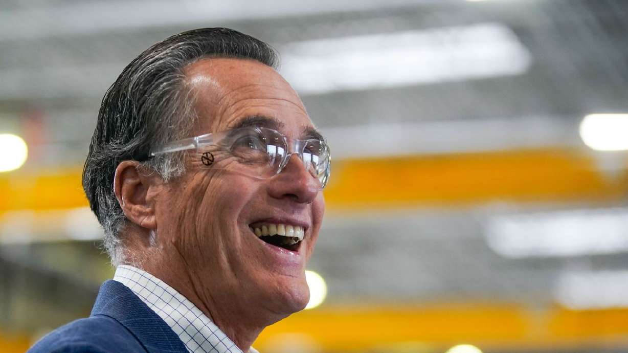 Sen. Mitt Romney, R-Utah, laughs as he tours Kenworth Sales in West Valley City on Nov. 12, 2021. A new Deseret
News/Hinckley Institute of Politics poll shows 51% of Republicans and 51% of Democrats in the state approve of his job performance. Romney does even a little better among unaffiliated voters with a 54% approval rating.