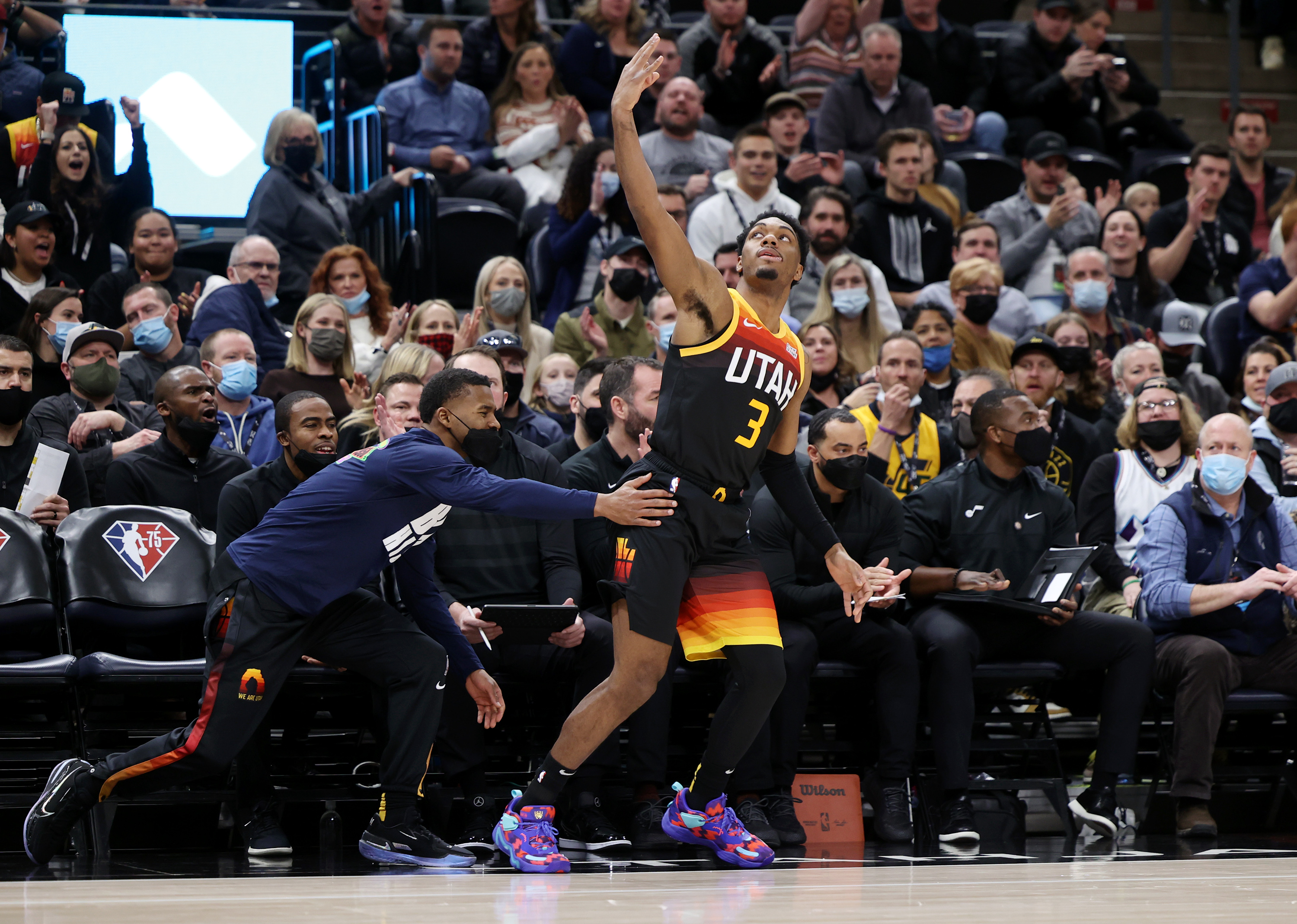 Utah Jazz guard Trent Forrest (3) celebrates after draining three point pointer as the Utah Jazz and the Denver Nuggets play an NBA basketball game at Vivint Arena in Salt Lake City on Wednesday, Feb. 2, 2022. Utah won 108-104.