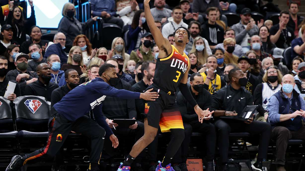 Utah Jazz guard Trent Forrest (3) celebrates after draining three point pointer as the Utah Jazz and the Denver Nuggets play an NBA basketball game at Vivint Arena in Salt Lake City on Wednesday, Feb. 2, 2022. Utah won 108-104.