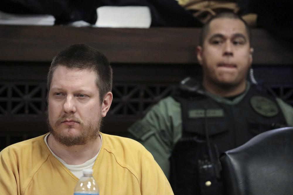 Former Chicago police Officer Jason Van Dyke, left, attends his sentencing hearing at the Leighton Criminal Court Building in Chicago, for the 2014 shooting of Laquan McDonald, Jan. 18, 2019.