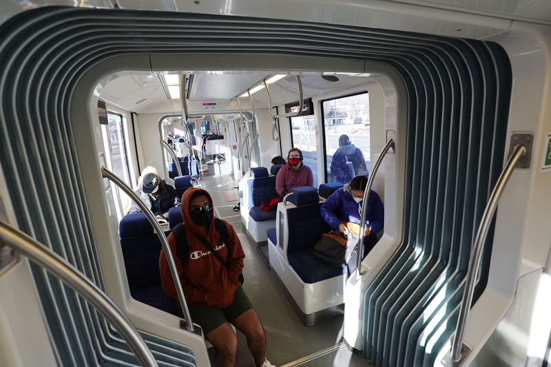 TRAX riders take a train during Free Fare February in
Salt Lake City on Tuesday. Free public transportation
across all of UTA’s network is available for the entire month of
February.