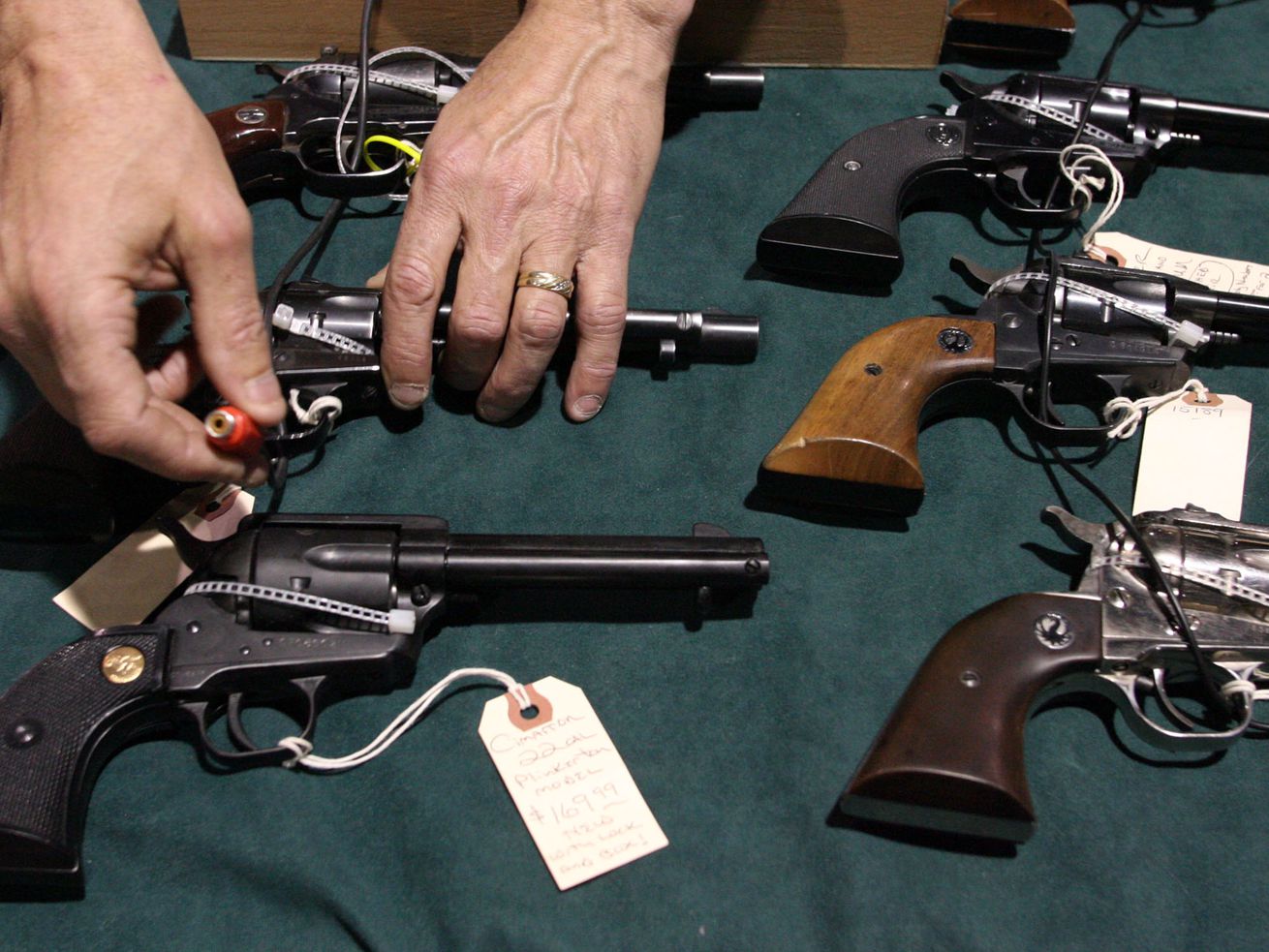 Alan Rogers, of Ashman’s Pioneer Market in Fillmore, sets up for the Crossroads of the West gun show at the South Towne
Expo Center in Sandy on November 21, 2008. After two years of failed attempts, a Utah bill that clarifies only the state — not
cities, counties or other local entities — can enact firearm regulations cleared a major legislative hurdle on Thursday.