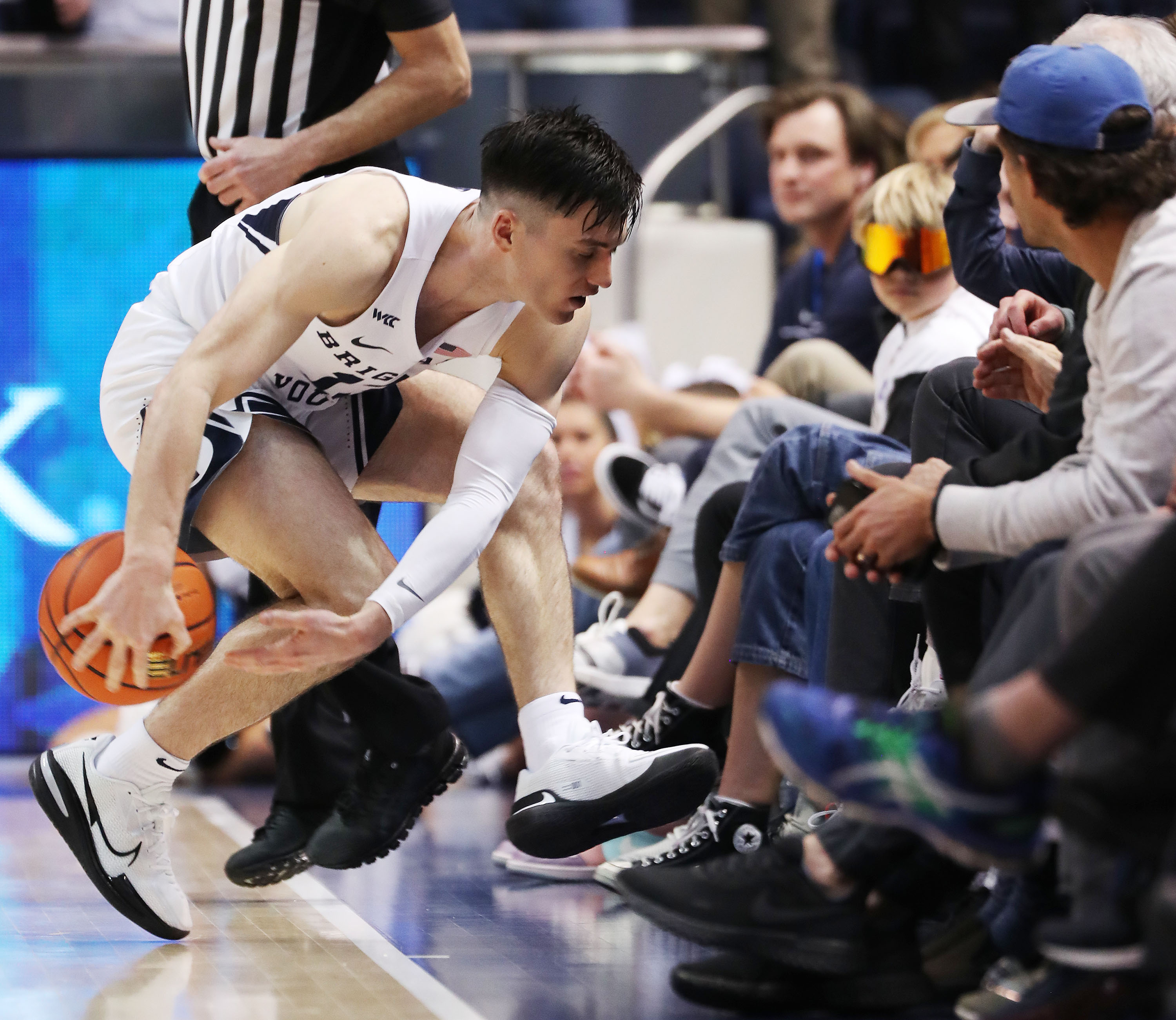 Brigham Young guard Alex Barcello (13) tries to steal the ball in Provo on Thursday, Feb. 3, 2022. San Francisco won 79-53.