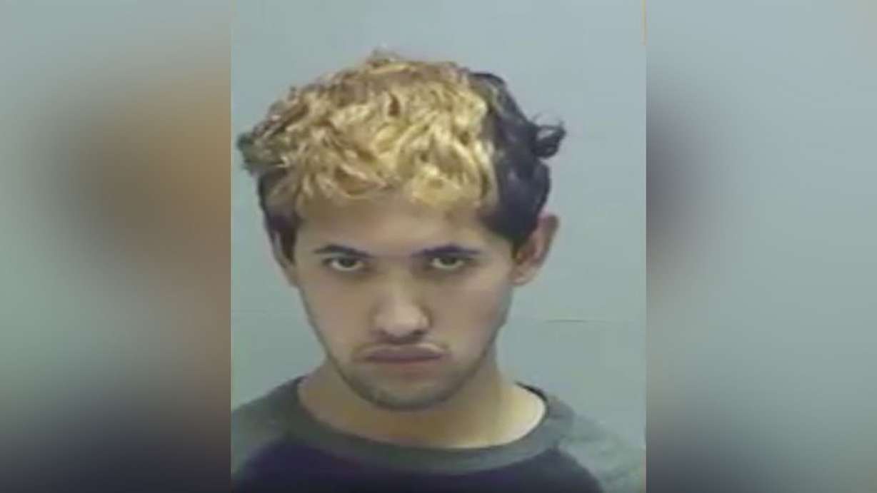 Jonathan Jareth Soberanis is pictured in a 2018 booking photo following an arrest.