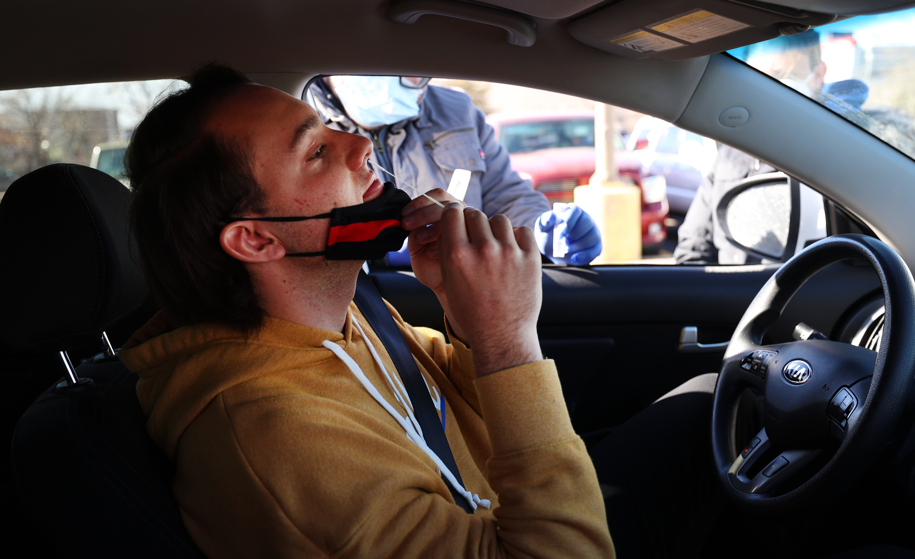 Von Satter, swabs his nose on Monday at the University of Utah. Utah reported 13 COVID-19 deaths and 2,808 new cases on Friday.