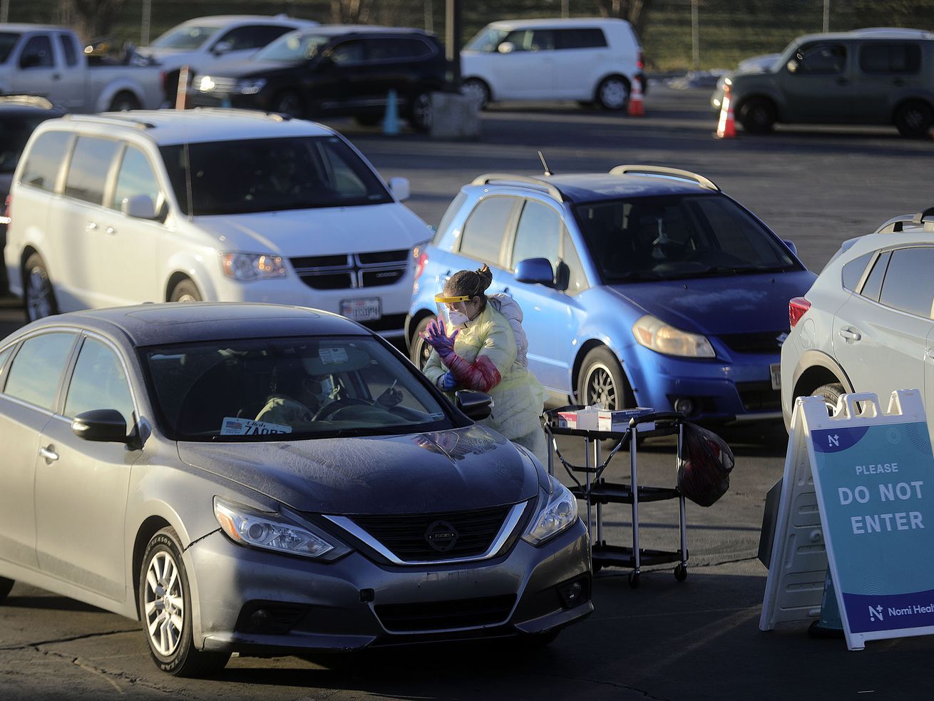 A medical worker administers a COVID-19 test outside of
the Maverik Center in West Valley City on Monday, Jan. 10. A majority of Utahns are concerned about getting COVID-19, but their biggest worry is that someone close to them will become seriously ill from the virus, according to a new poll.