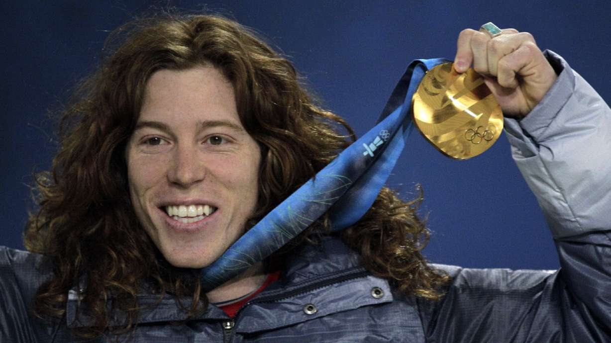 United States' gold medalist Shaun White reacts during the men's halfpipe medal ceremony at the Vancouver 2010 Olympics in Vancouver, British Columbia, Thursday, Feb. 18, 2010.