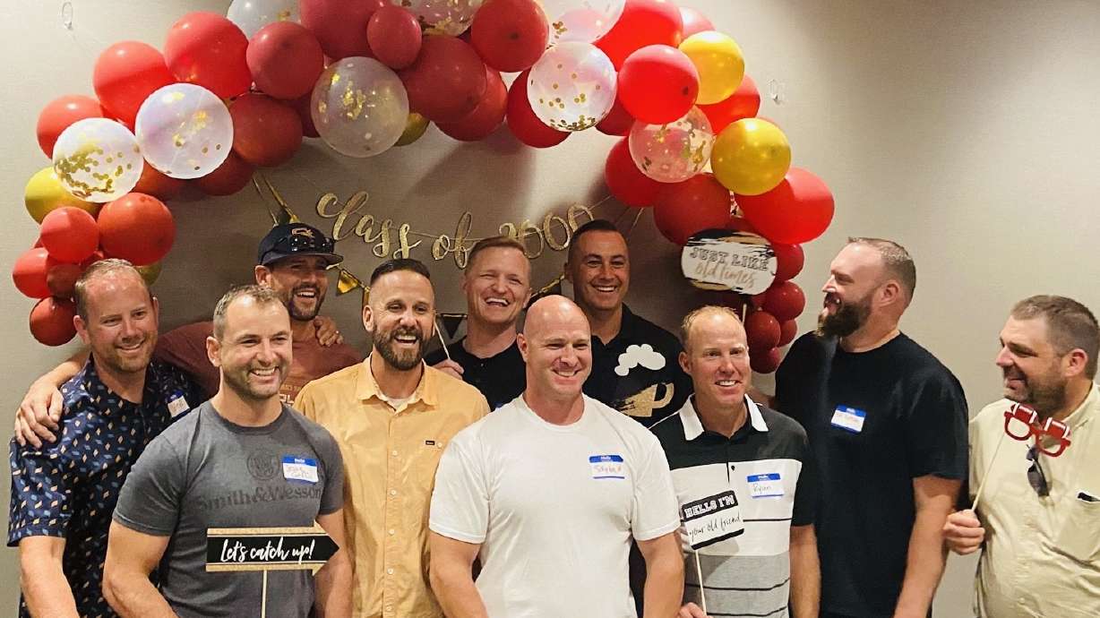 Classmates from the year 2000 pose for a picture at their 20-year reunion that was held in August 2021.