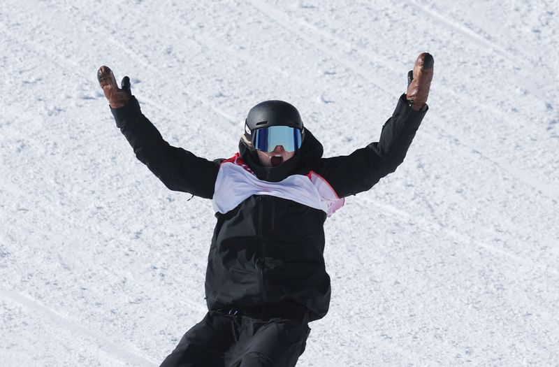 2022 Beijing Olympics - Snowboard - Women's SBD SS Final Run 3 - Genting Snow Park, Zhangjiakou, China - February 6, 2022. Zoi Sadowski Synnott of New Zealand celebrates after winning gold.