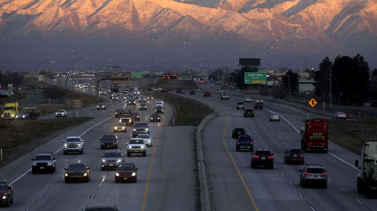 Traffic moves along state Route 201 during rush hour in Salt Lake City on Monday, Jan. 24.