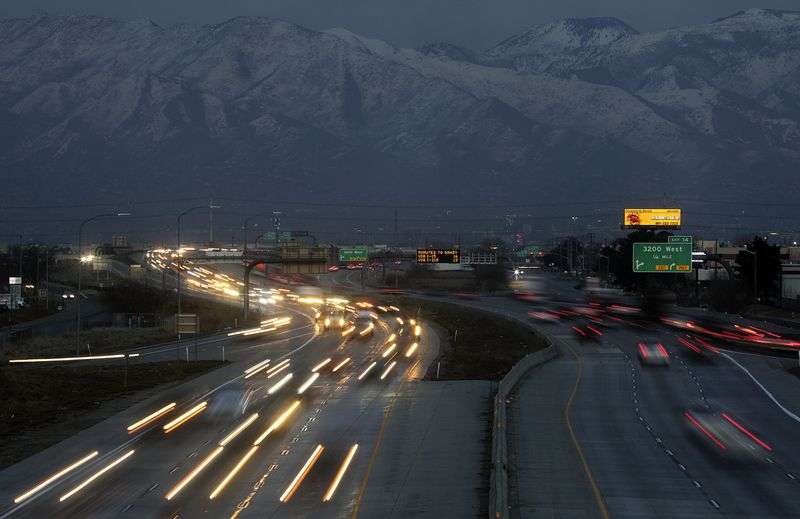 Traffic moves along state Route 201 during rush hour in
Salt Lake City on Monday, Jan. 24.