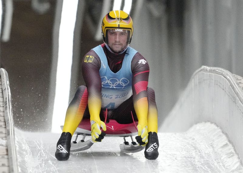 Feb 6, 2022; Yanqing, China; Johannes Ludwig (GER) after his third run in the men's singles luge competition during the Beijing 2022 Olympic Winter Games at Yanqing Sliding Centre.