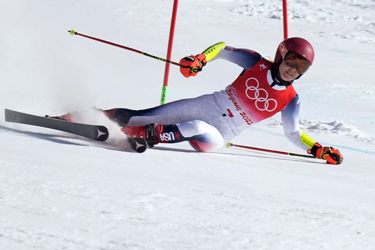 Mikaela Shiffrin of United States loses control and skis off course during the first run of the women's giant slalom at the 2022 Winter Olympics, Monday, in the Yanqing district of Beijing.