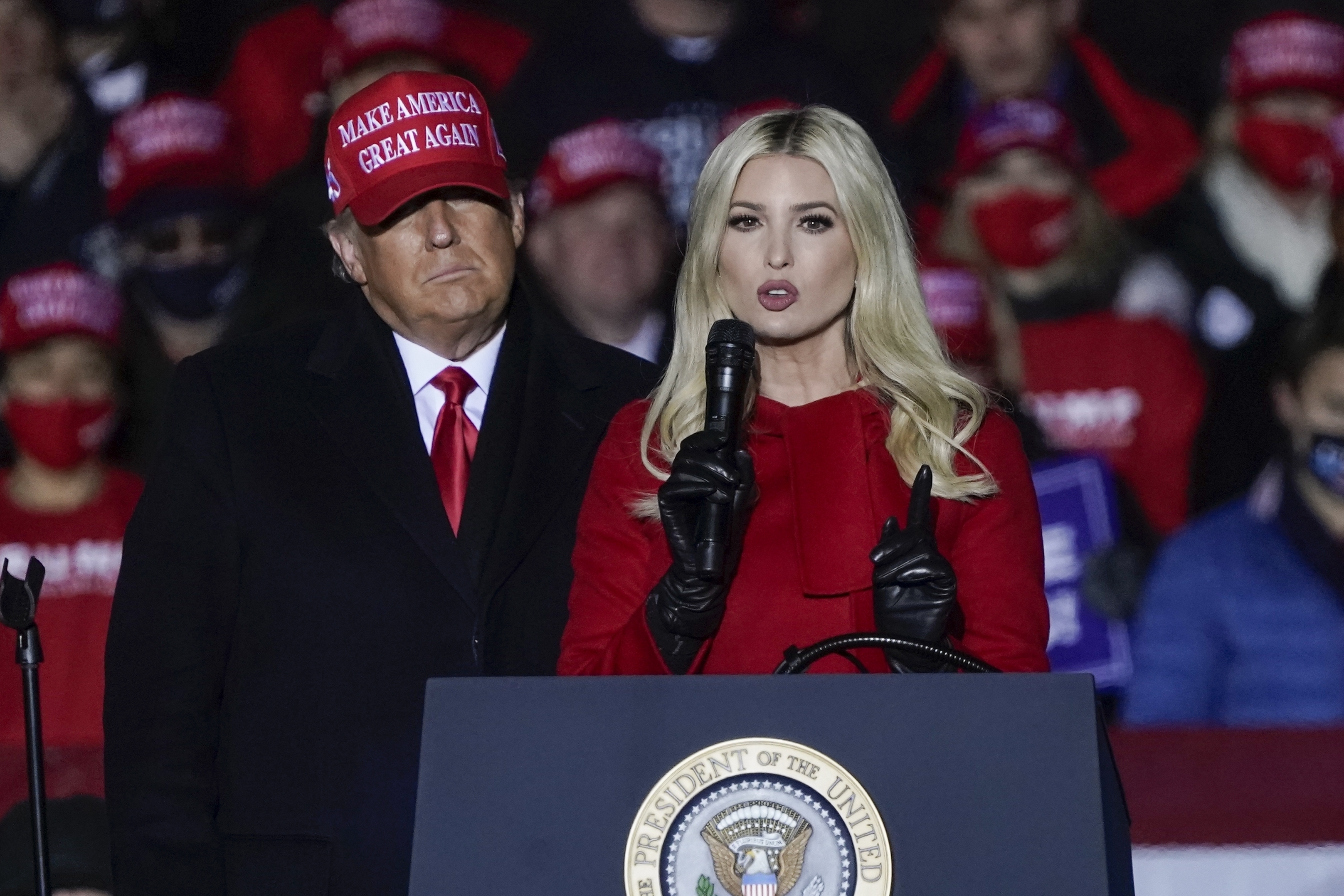 President Donald Trump watches as daughter Ivanka Trump speaks at a campaign event Nov. 2, 2020, in Kenosha, Wis. The House committee investigating the attack on the U.S. Capitol wants to know what Ivanka Trump heard and saw that day as they try to stitch together the narrative of the riots and Donald Trump's role in instigating them. 