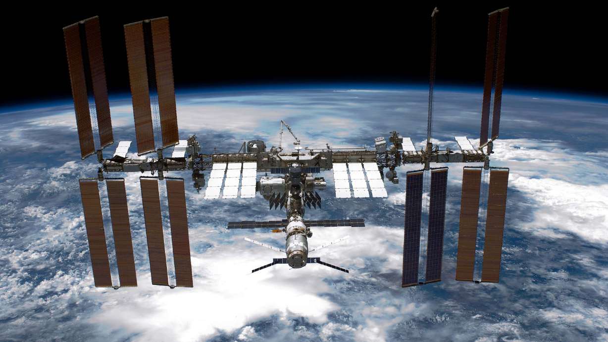 The International Space Station is seen from NASA space shuttle Endeavour after the station and shuttle began their post-undocking relative separation May 29, 2011, in space. The most recent roadmap for decommissioning the ISS lays out a plan to bring the space station out of orbit in January 2031.