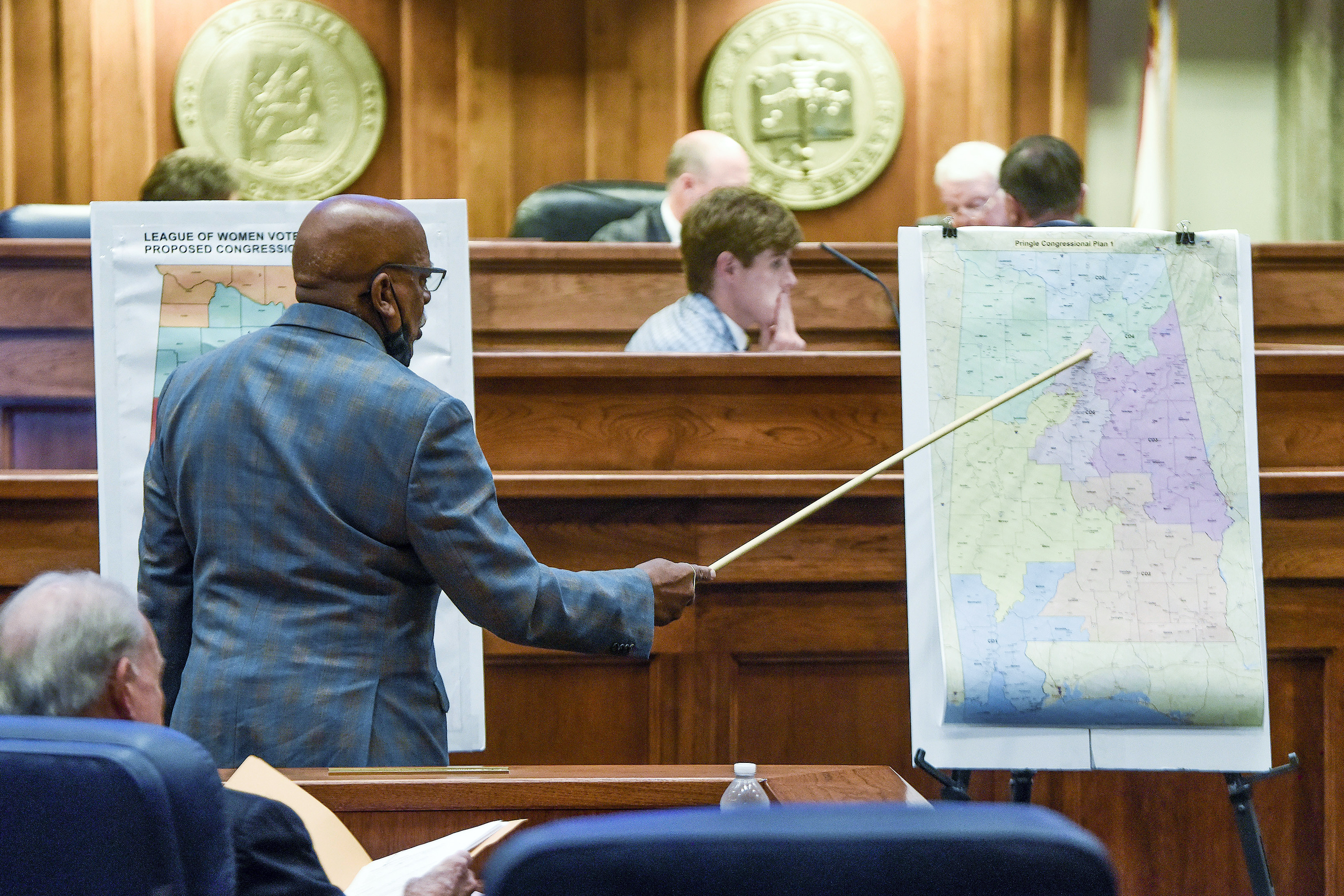 Sen. Rodger Smitherman compares U.S. Representative district maps during the special session on redistricting at the Alabama Statehouse in Montgomery, Ala., on Nov. 3, 2021. The Supreme Court has put on hold a lower court ruling that Alabama must draw new congressional districts before the 2022 elections.