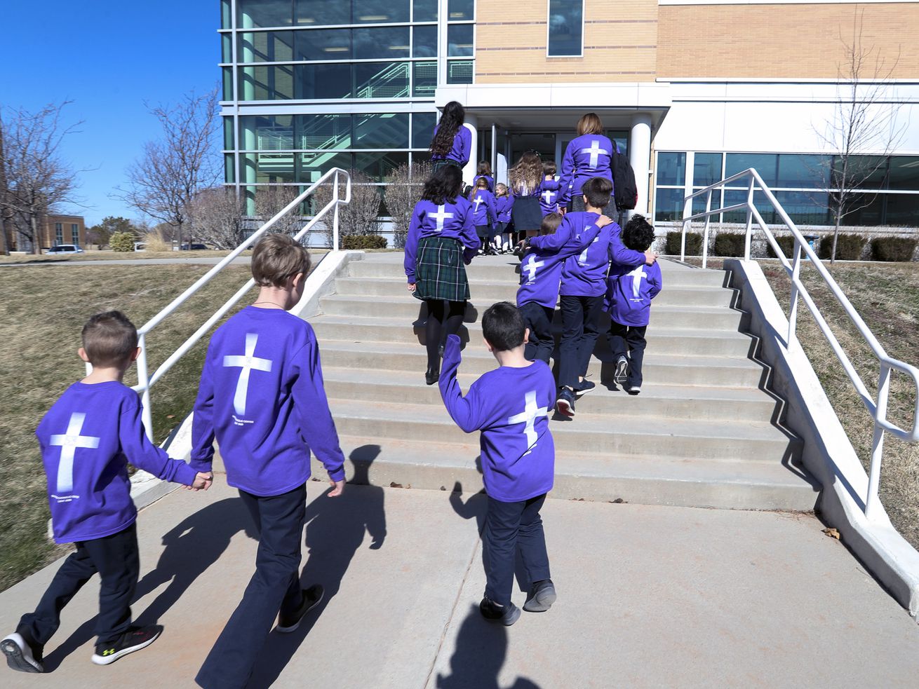 Students from St. John the Baptist Elementary, a private school, head back to class in Draper on Feb. 26, 2020. Newly introduced legislation would allow parents to direct state funds designated for their child's education to private schools and service providers.