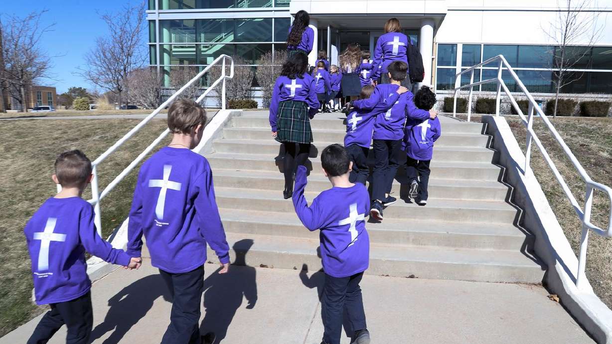 Students from St. John the Baptist Elementary, a private school, head back to class in Draper on Feb. 26, 2020. Newly introduced legislation would allow parents to direct state funds designated for their child's education to private schools and service providers.
