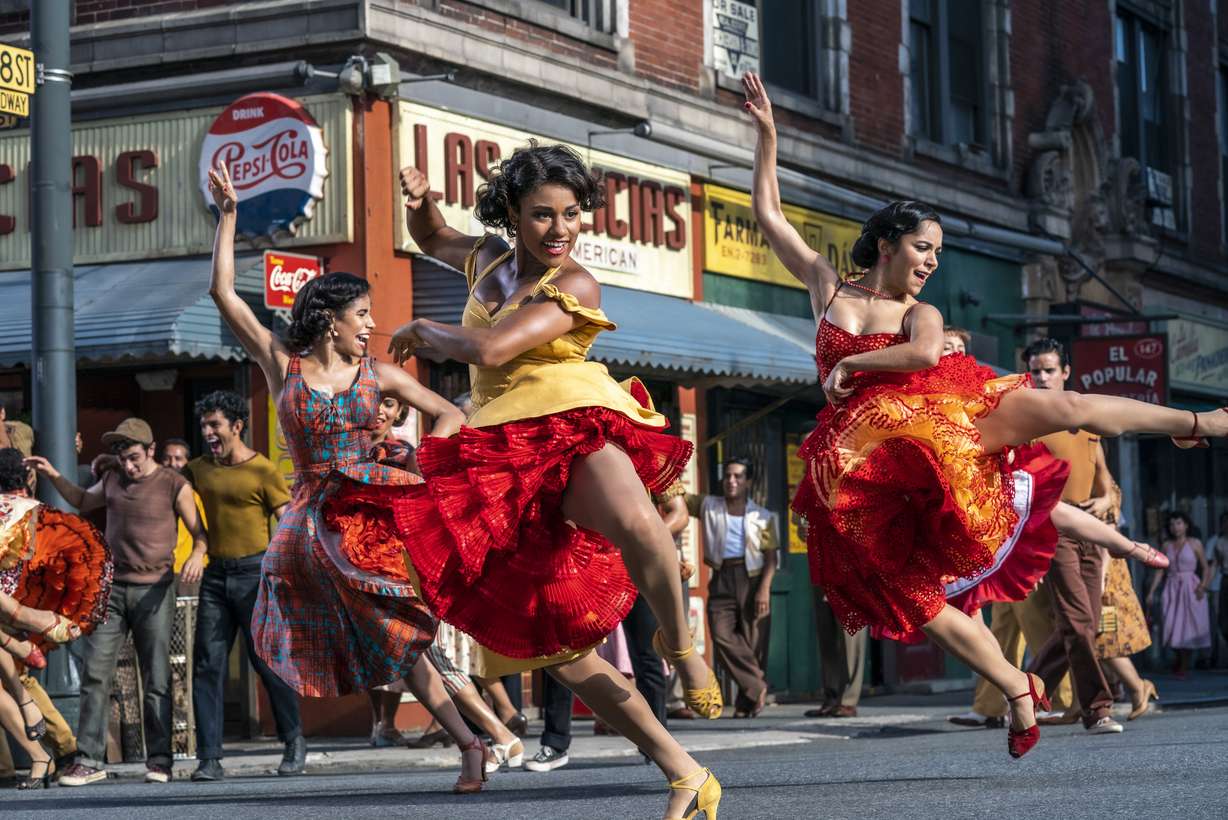 This image released by 20th Century Studios shows, from left, Ilda Mason as Luz, Ariana DeBose as Anita, and Ana Isabelle as Rosalia in "West Side Story."