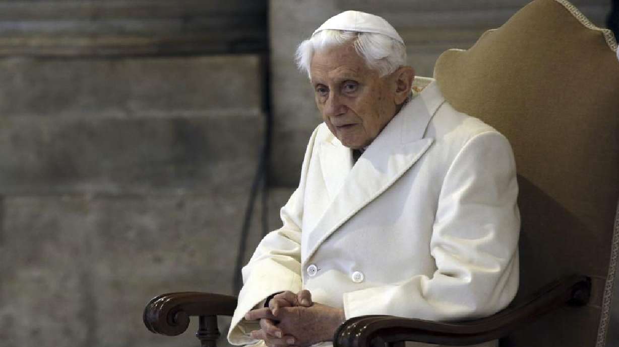 This Dec. 8, 2015 photo shows Pope Emeritus Benedict XVI sitting in St. Peter's Basilica as he attends the ceremony marking the start of the Holy Year. He asked forgiveness Tuesday for any “grievous faults" in his handling of clergy sex abuse cases, but admitted to no personal or specific wrongdoing.
