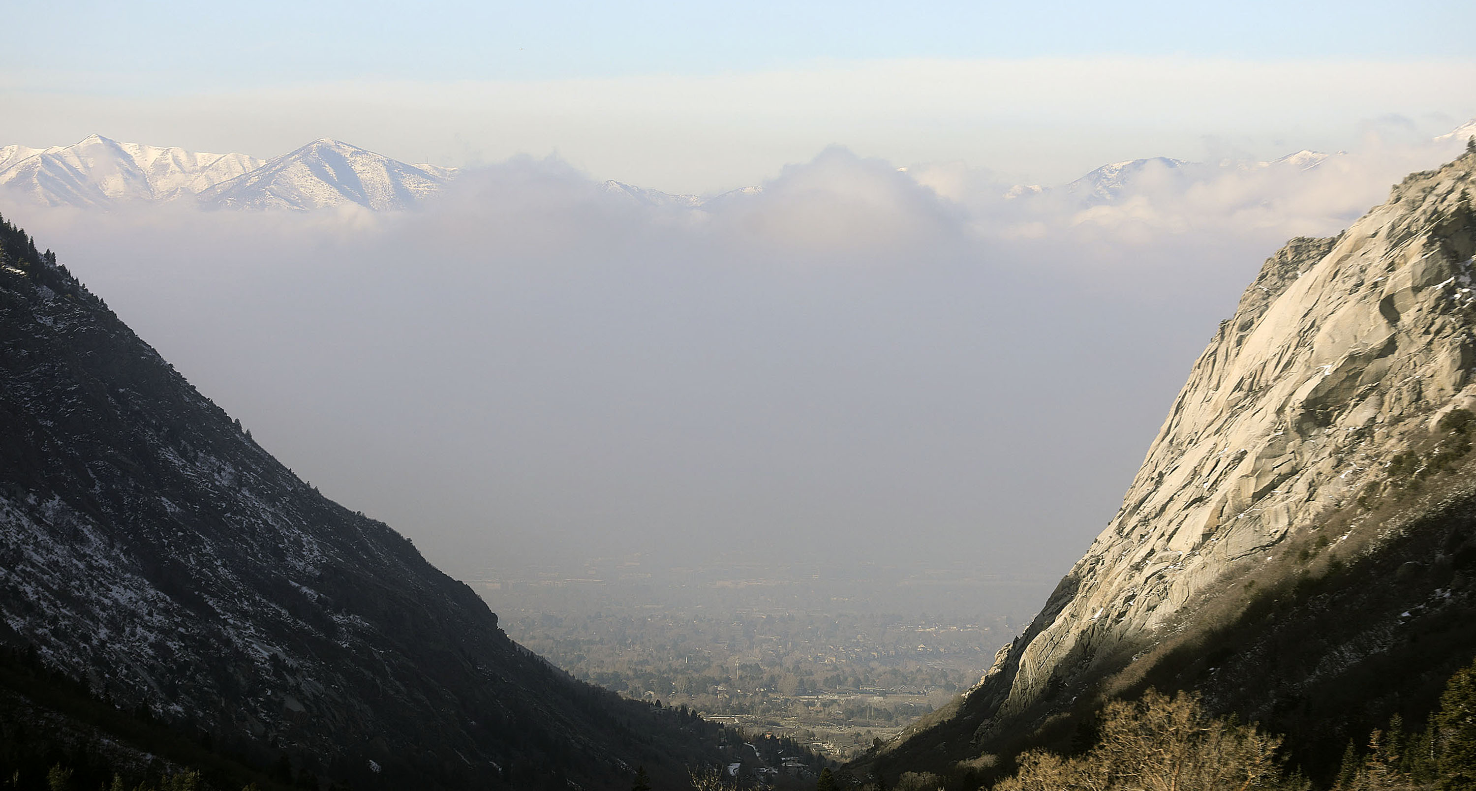 Smog blankets the Salt Lake Valley during an inversion, as seen from Little Cottonwood Canyon on Jan. 20. Utah posted its third-driest January on record this year, according to data released Tuesday. Inversion conditions are expected to remain in Utah this week before the possibility of storms returns to close out this month.