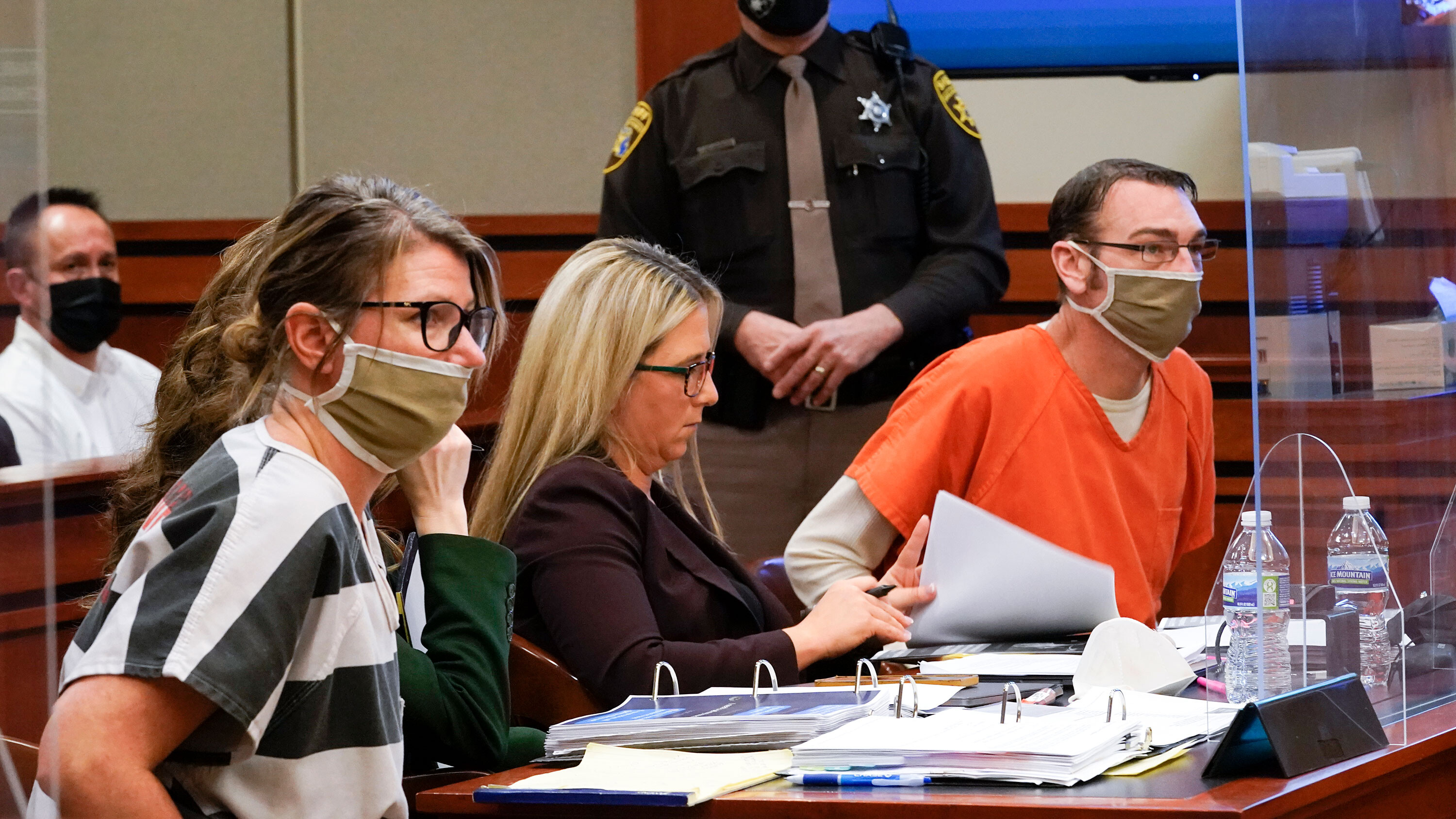 Jennifer Crumbley, left, and James Crumbley, right, the parents of alleged school shooter Ethan Crumbley, appeared in court Tuesday in a preliminary hearing.