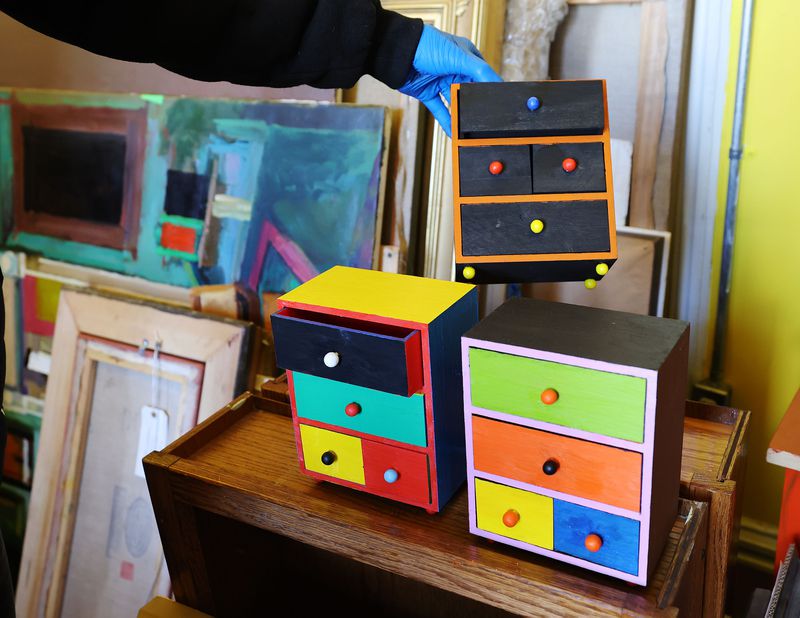 Jason Dickerson, a multimedia artist, looks over some
of his Furniture 4 Clowns work at the historic Guthrie Building in
Salt Lake City on Feb. 4.