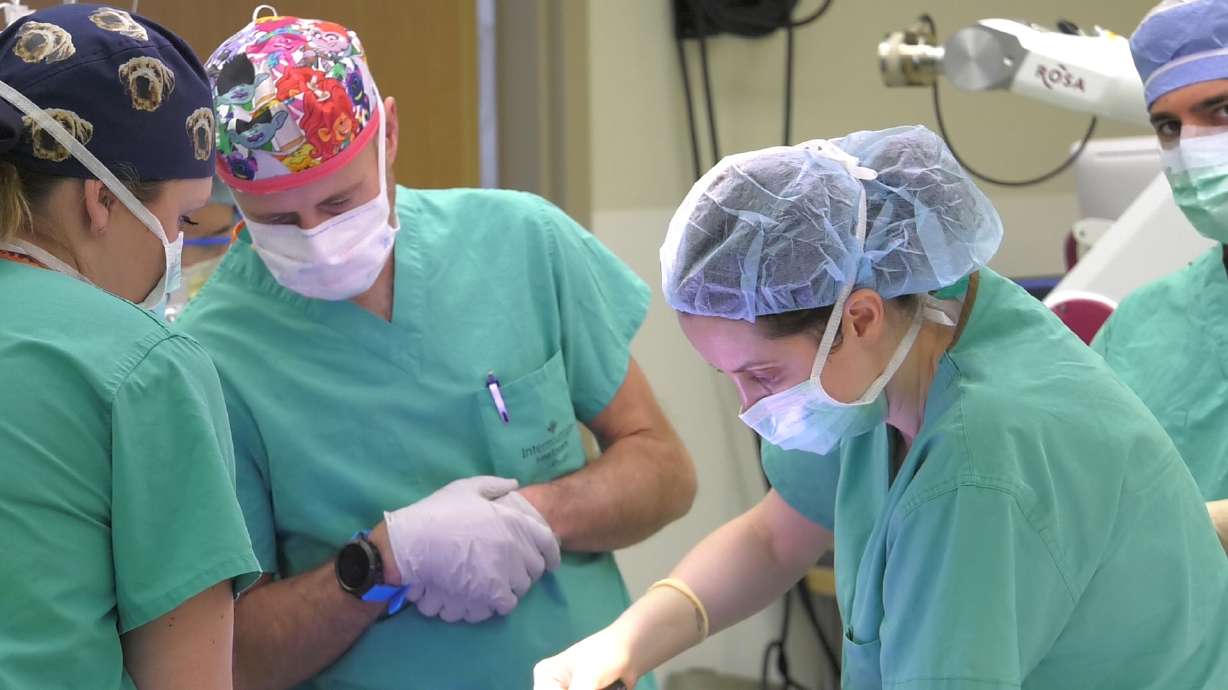 Doctors at Primary Children's Hospital perform a surgery using an intraoperative MRI machine. On Tuesday, doctors said the machine has been able to help them do more minimally invasive procedures.
