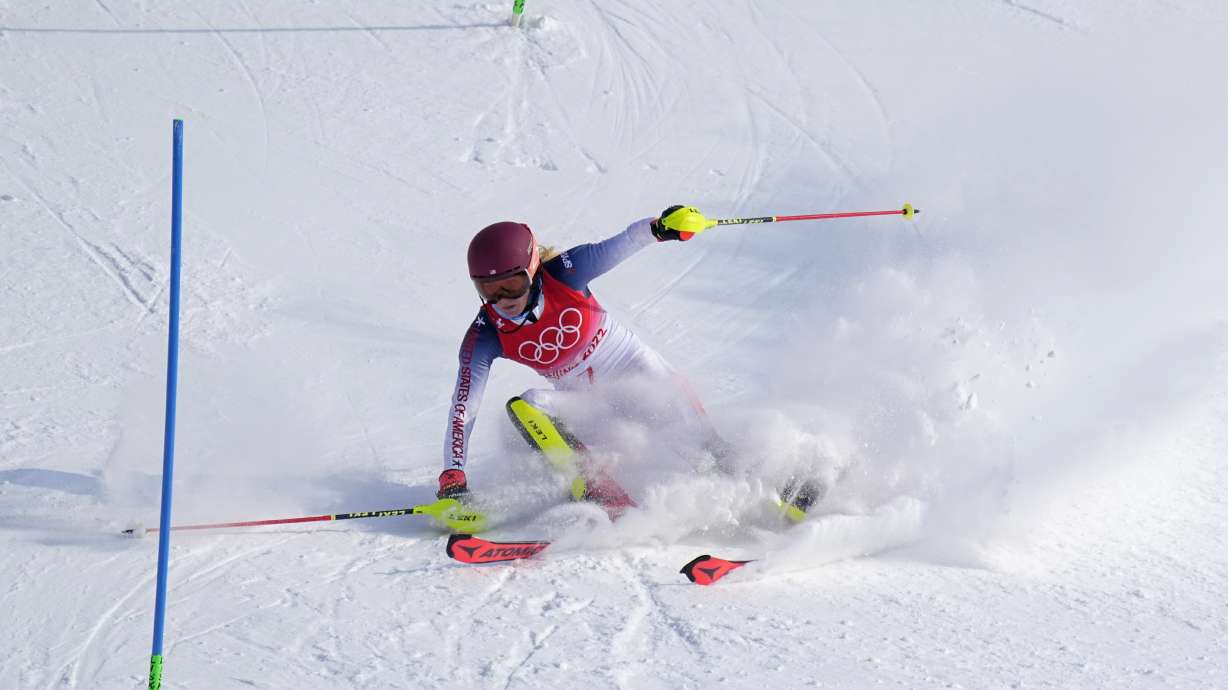 Mikaela Shiffrin, of the United States skis out in the first run of the women's slalom at the 2022 Winter Olympics, Wednesday, Feb. 9, 2022, in the Yanqing district of Beijing.