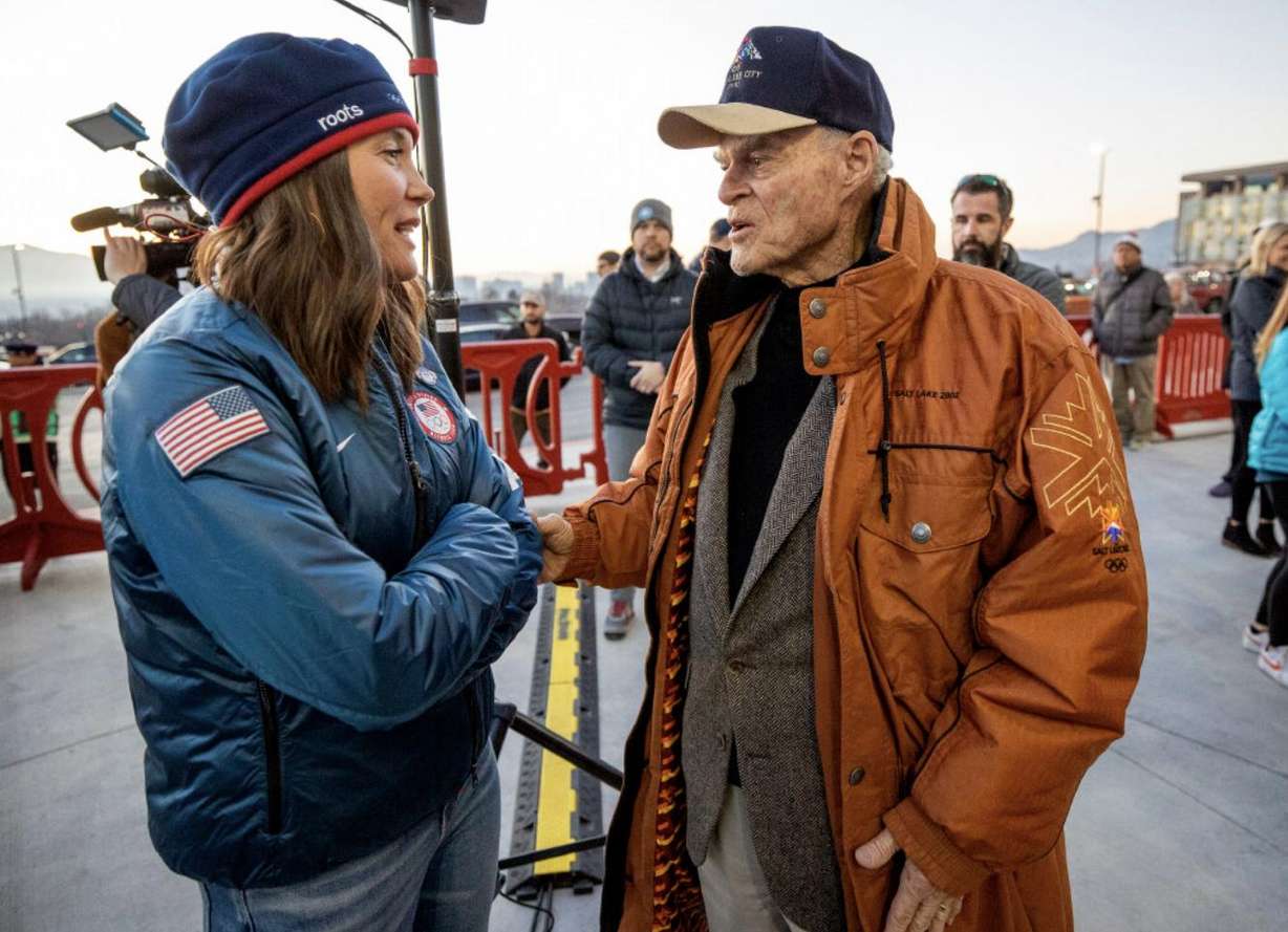 Salt Lake City Mayor Erin Mendenhall and Spence Eccles talk as they join hundreds gathered at Rice-Eccles Stadium at the University of Utah on Tuesday, Feb. 8, 2022, to watch the Olympic Cauldron be lit, marking the 20-year anniversary of the Salt Lake 2002 Olympics opening ceremony.