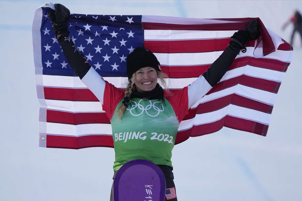 United States athlete and former Westminster College student Lindsey Jacobellis celebrates after winning a gold medal in the women's cross finals at the 2022 Winter Olympics, Wednesday, Feb. 9, 2022, in Zhangjiakou, China.