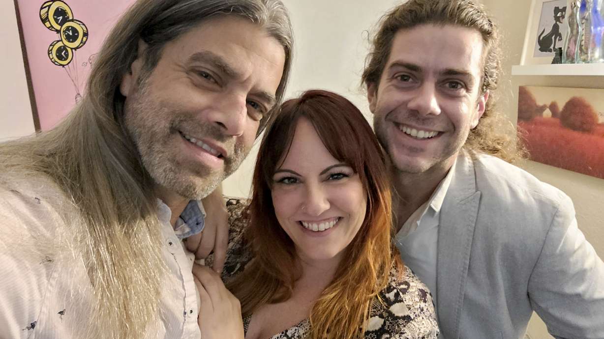 This image provided by Ryan Cohen shows, from left, Ryan Cohen, his wife, Emily Taffel, and Taffel's former boyfriend, Sam Rubman, on Feb. 3, 2022, in Coral Springs, Fla. In the era of intense cybersecurity and calls for multifactor lockdown of all things digital, the three share several logins to streaming services.