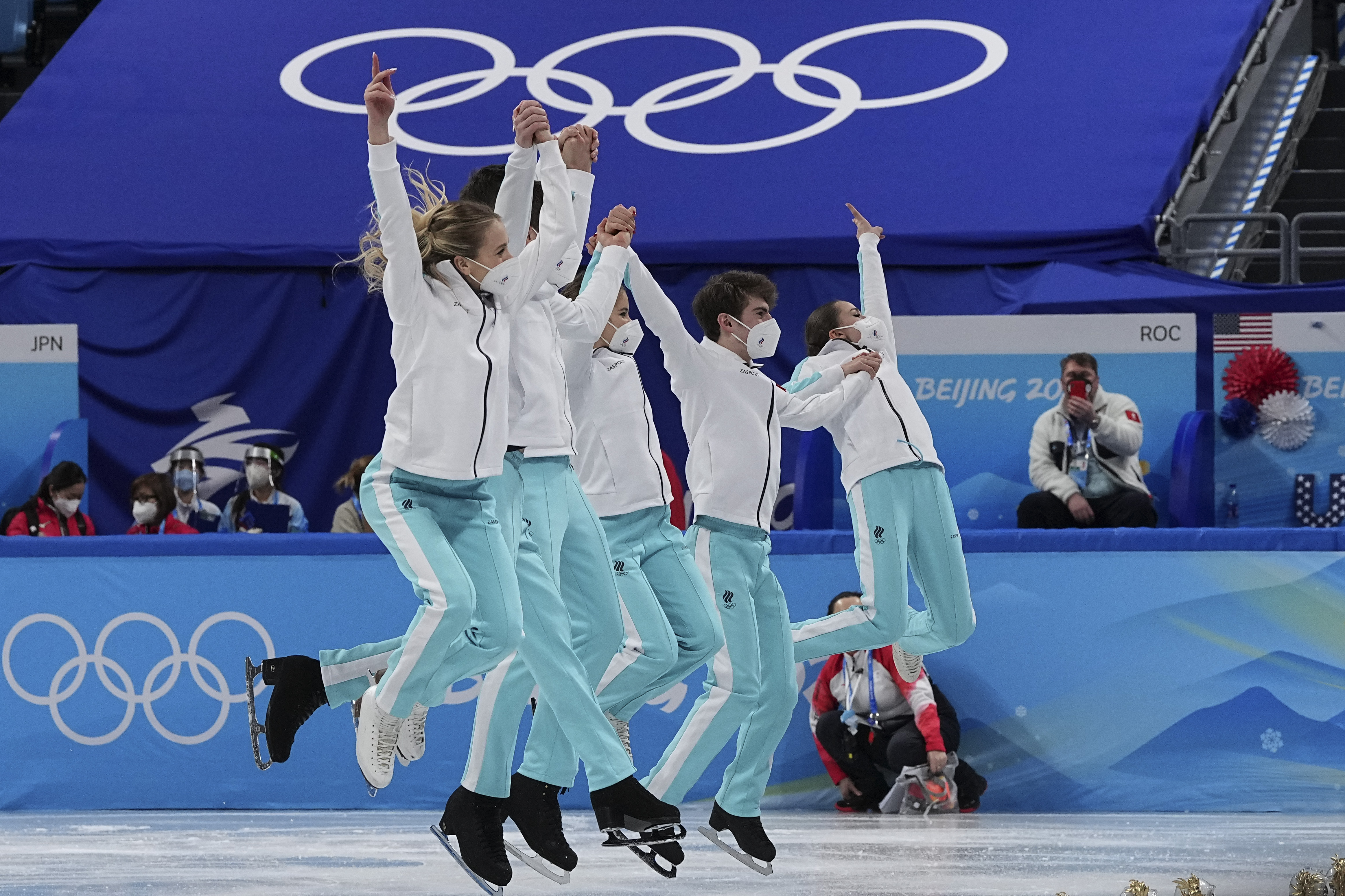 Gold medalists team from the Russian Olympic Committee celebrates following the victory ceremony after the team event in the figure skating competition at the 2022 Winter Olympics, Monday, Feb. 7, 2022, in Beijing. 