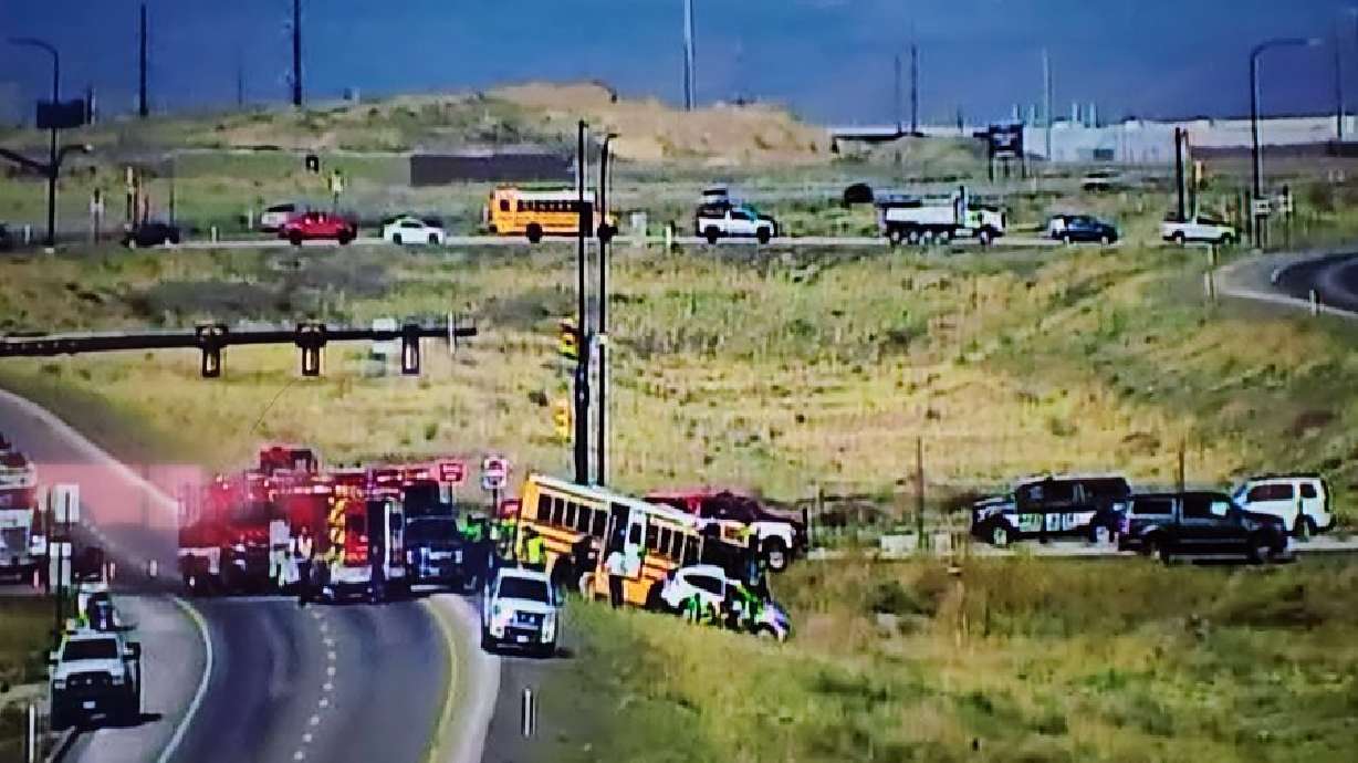 A woman was killed Wednesday in a crash involving a school bus on the Mountain View Corridor in South Jordan.