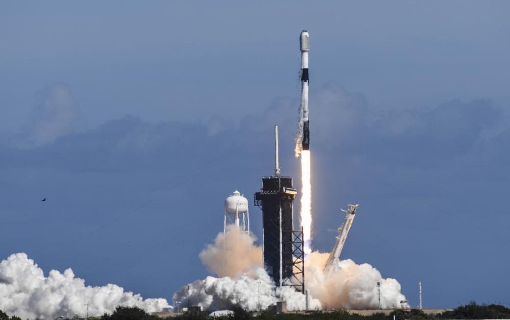 A SpaceX Falcon 9 rocket lifts off from Pad 39A at Kennedy Space Center, Fla., Feb. 3. The rocket is carrying a batch of Starlink satellites. SpaceX's newest fleet of Starlink satellites are tumbling out of orbit because of a geomagnetic storm. 