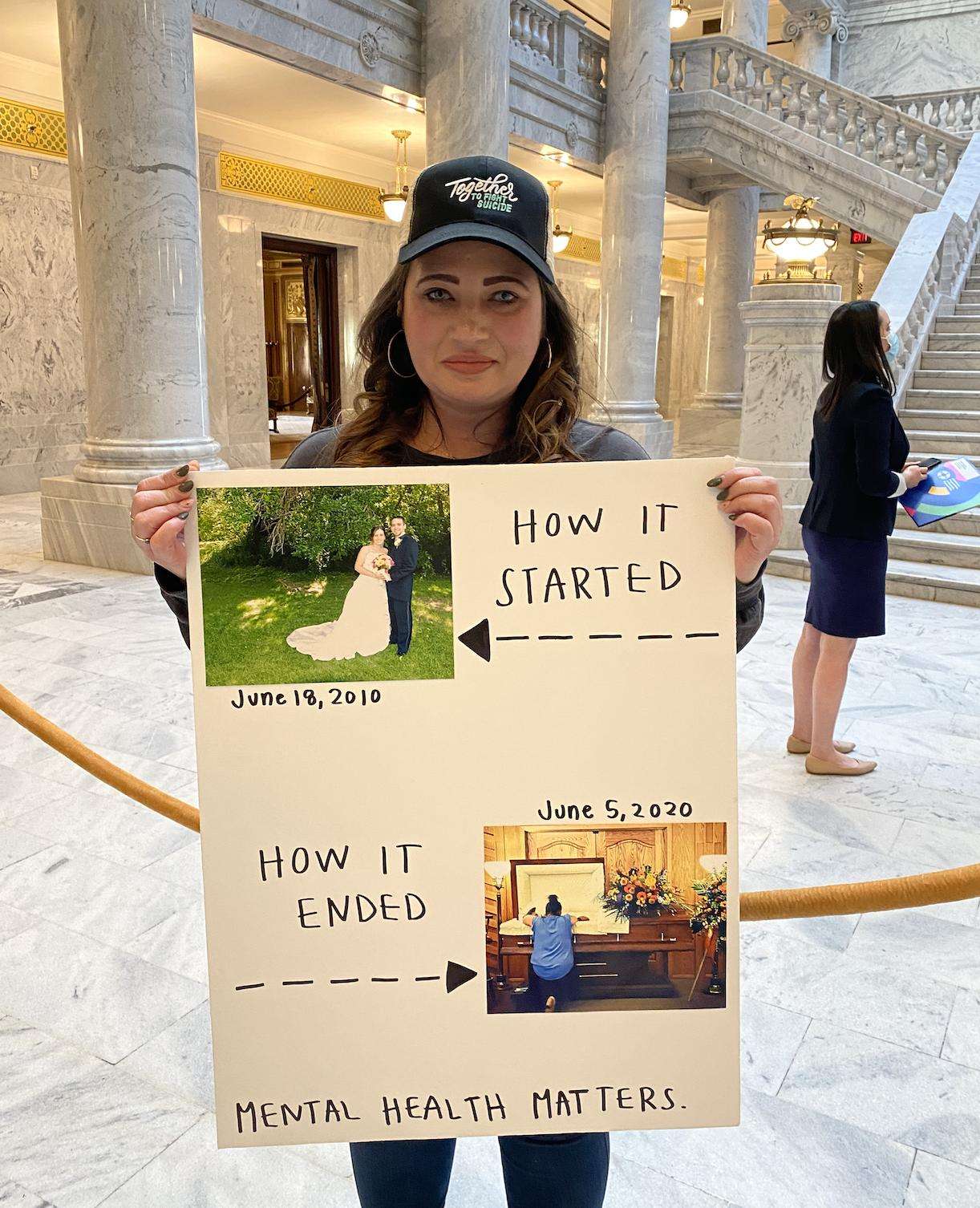 Mental health advocate Amanda Hurst holds a sign during a suicide prevention rally at the Utah Capitol on Tuesday.
