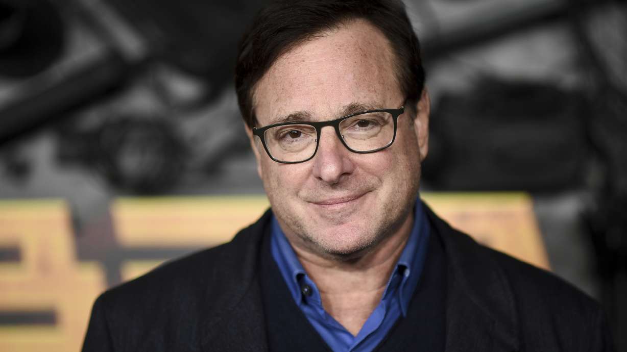 Bob Saget arrives at a screening of "MacGruber" on Dec. 8, 2021, in Los Angeles. Saget's family has released a statement on the cause of his death last month in Florida.