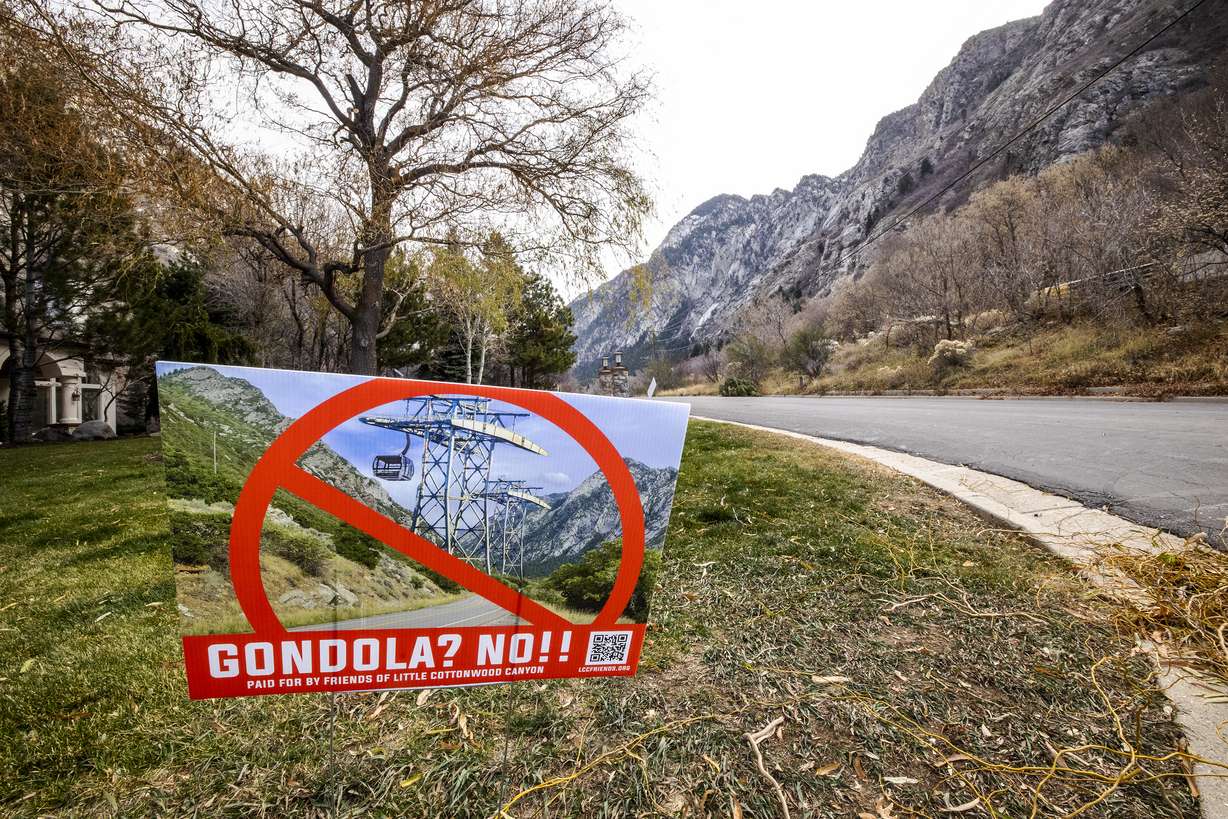 A sign opposed to a gondola is pictured in a yard near the mouth of Little Cottonwood Canyon in Cottonwood Heights on Tuesday, Dec. 7. Students for the Wasatch is a student group at the University of Utah in opposition to UDOT's transportation proposals meant to ease traffic congestion for Little Cottonwood Canyon.
