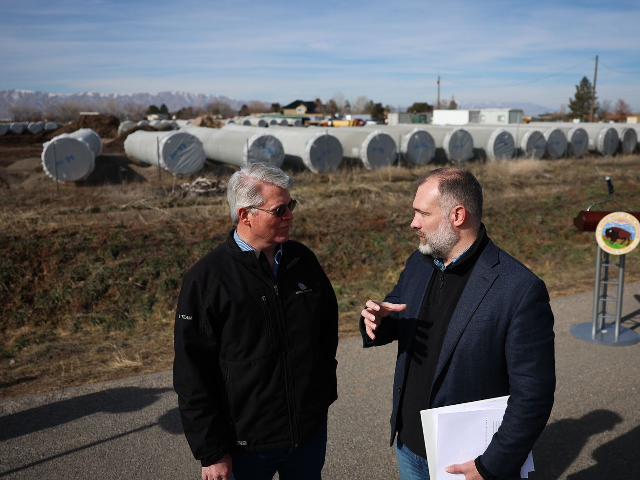 Reed Murray, director of the Central Utah Project for
the U.S. Department of the Interior, left, and Deputy Secretary of
the Interior Tommy Beaudreau talk after touring portions of the
Central Utah Project in Spanish Fork on Thursday.