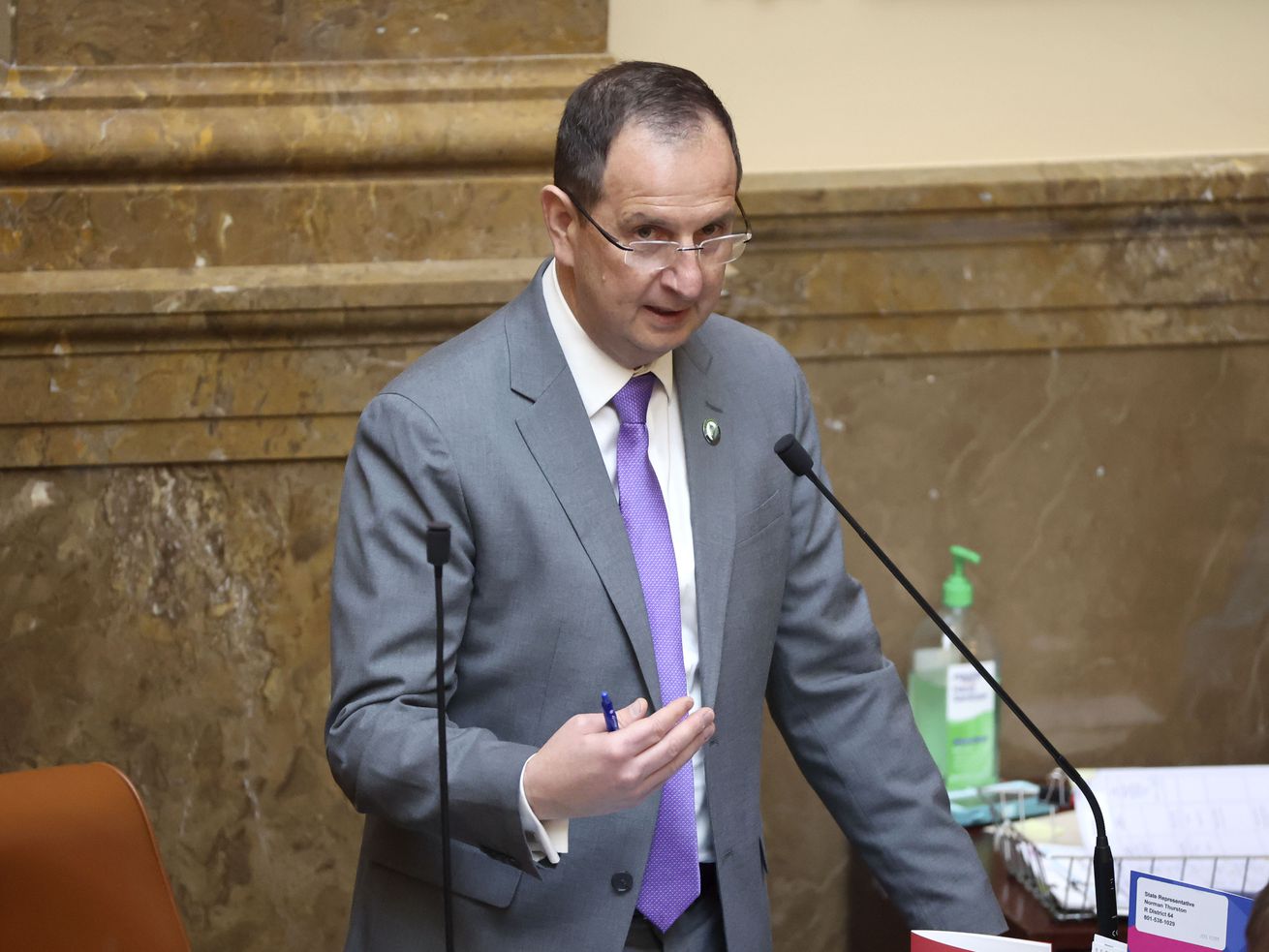 Rep. Norm Thurston, R-Provo, talks about HB217,
Telephone Solicitations Amendments, which he is sponsoring, in the
House chamber at the Capitol in Salt Lake City on Thursday.