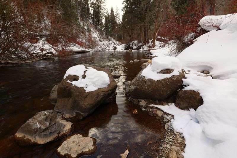 Water runs out of Tibble Fork Reservoir in American
Fork Canyon on Tuesday.